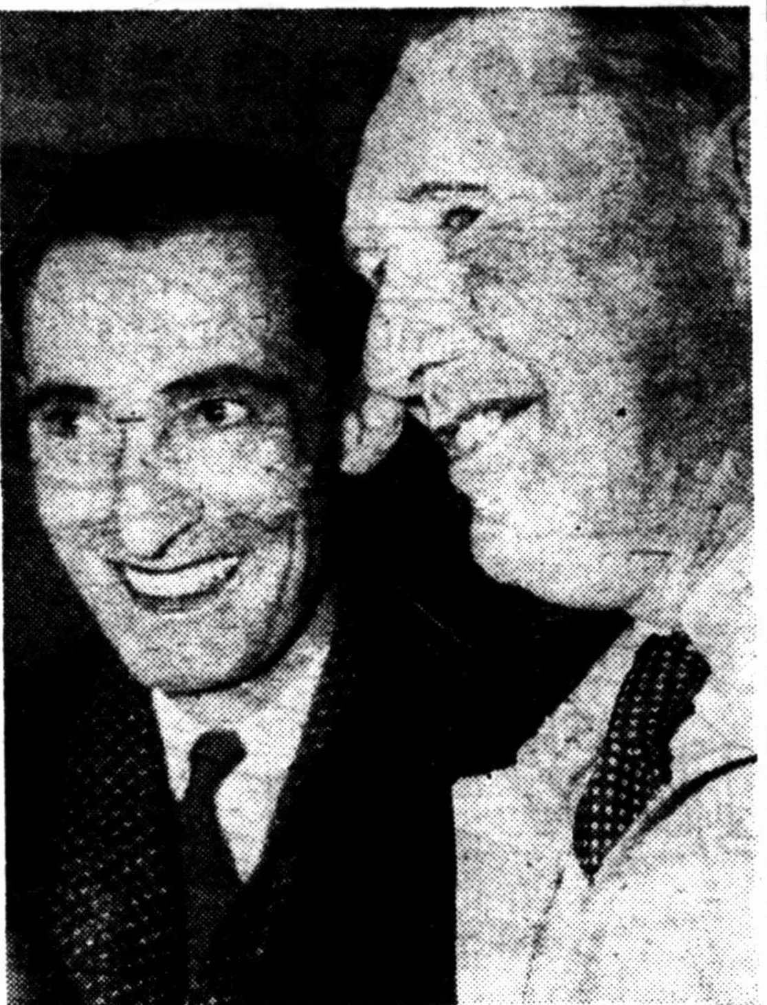 A newspaper photograph of two men in suits, smiling, cheek by jowl: Bob Skene on the left and Geoff Ashton on the right.